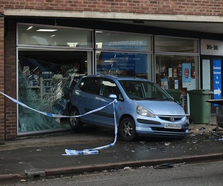 Shop window repaired and bollards added